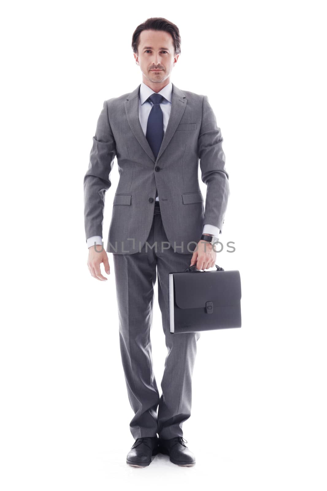 Full body portrait of young business man with briefcase isolated on white