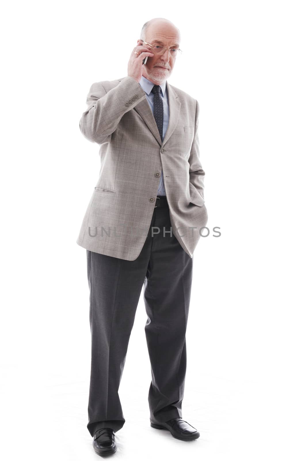 Portrait of mature business man with cellphone isolated on white background