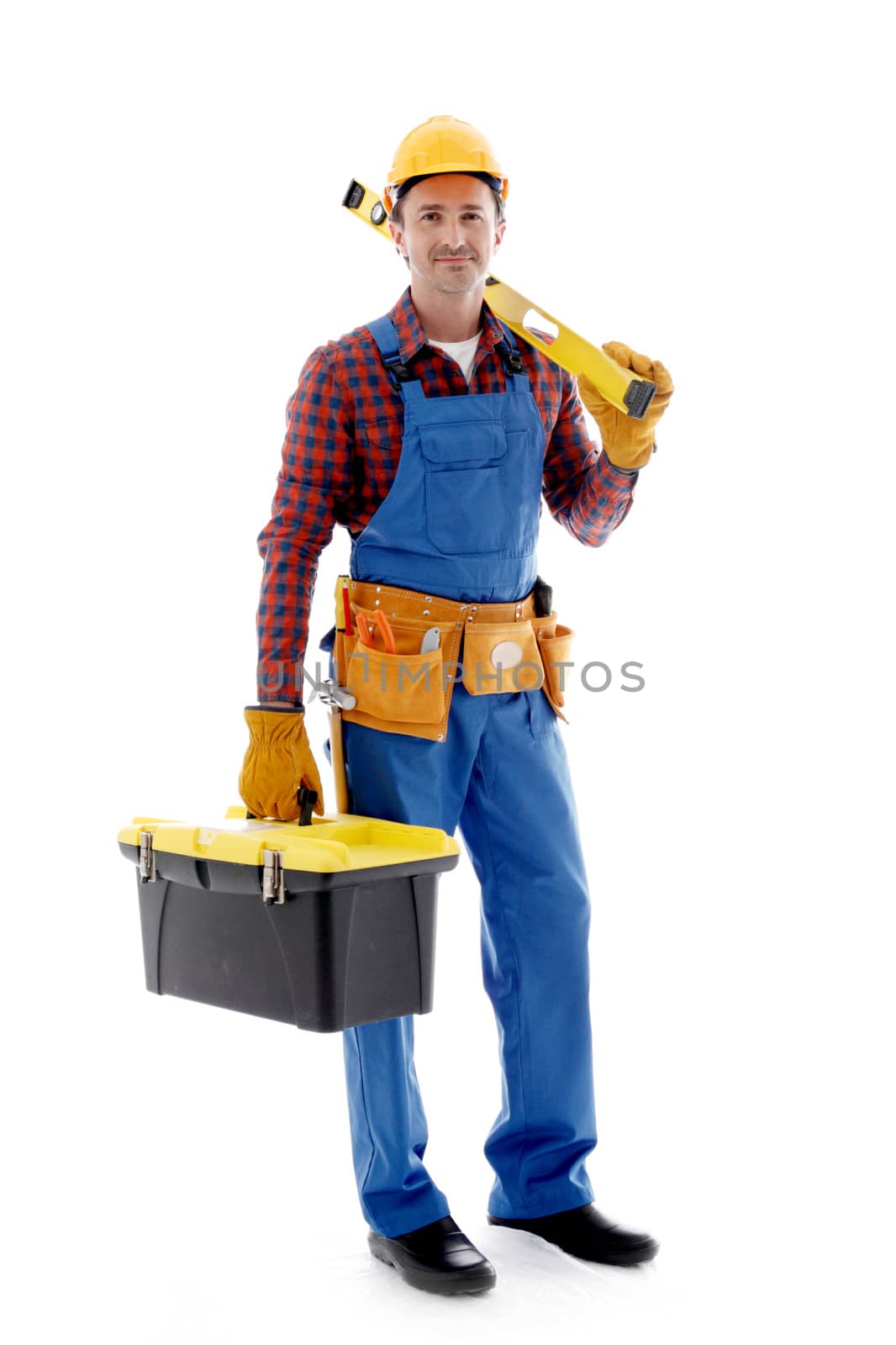Young friendly manual worker with tools isolated on white background