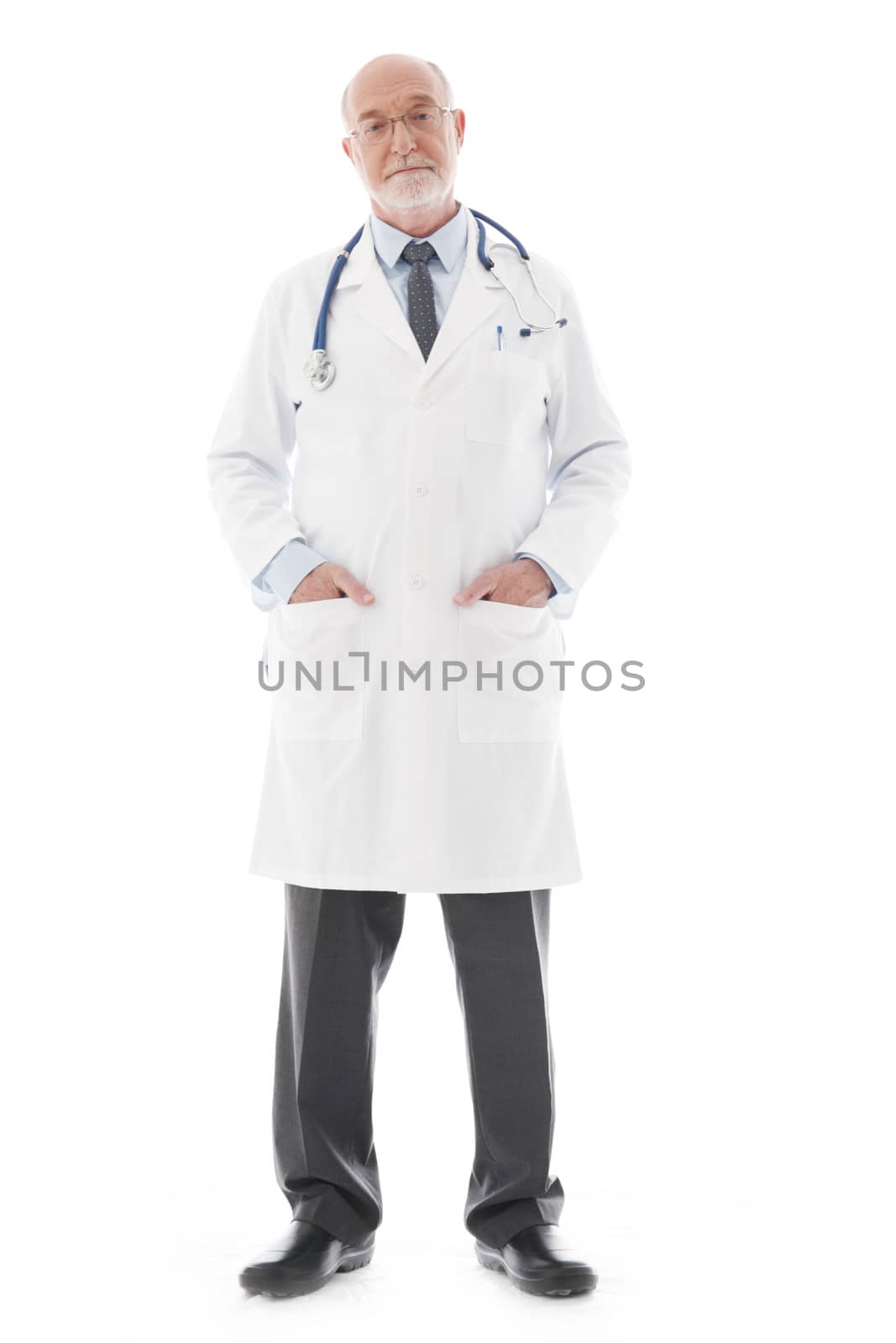 Full length portrait of a mature doctor isolated on white background