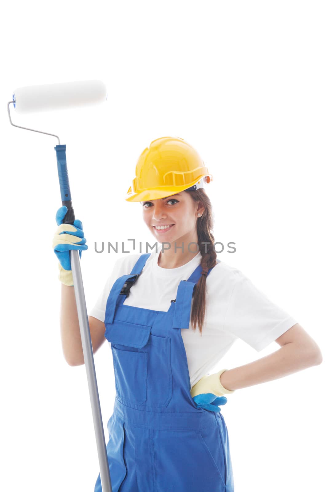 Young beautiful handywoman with paint roller isolated on white