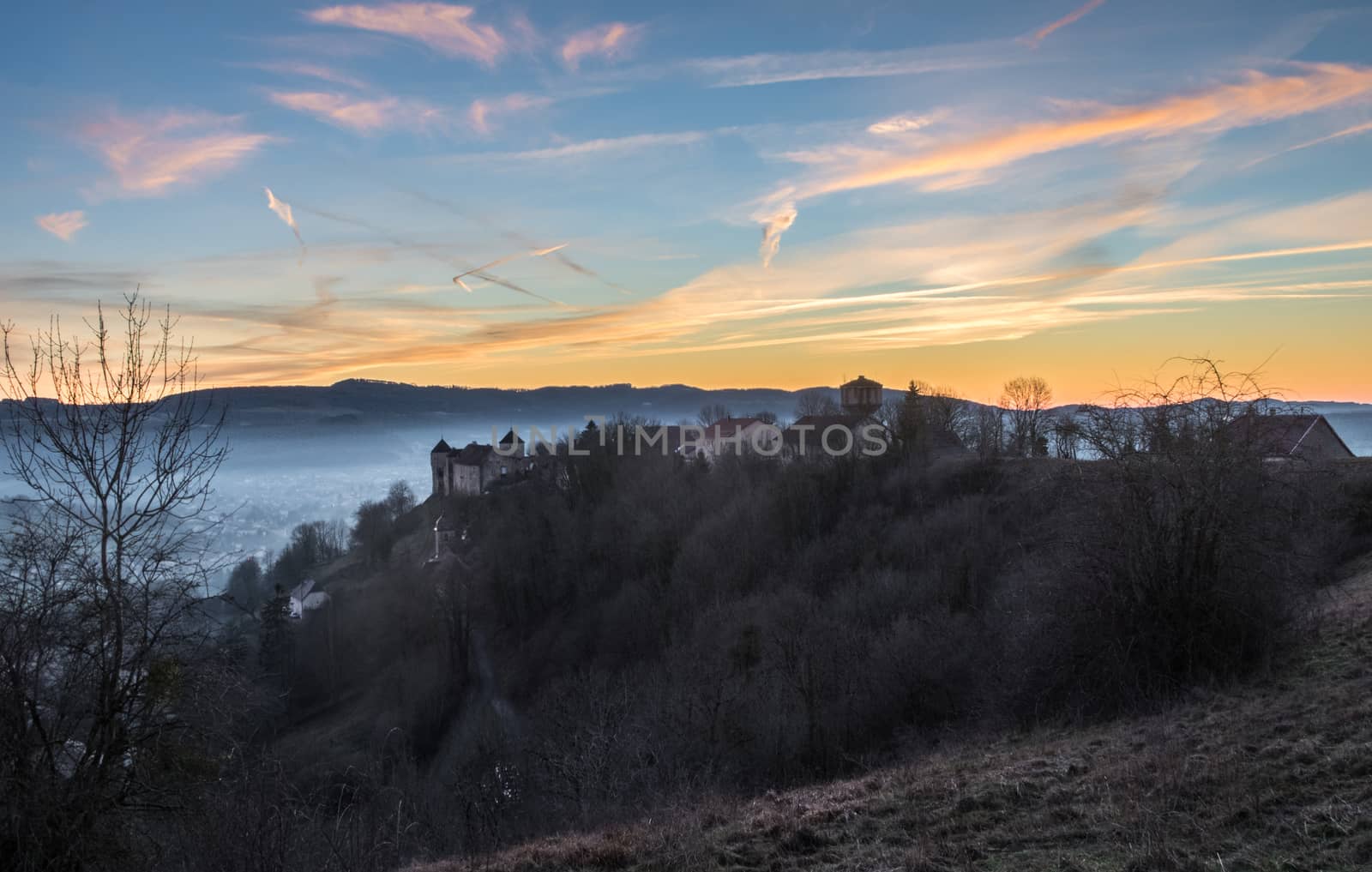 HDR shot of Belvoir castle in France. Landscape of small mountains, fields and forest