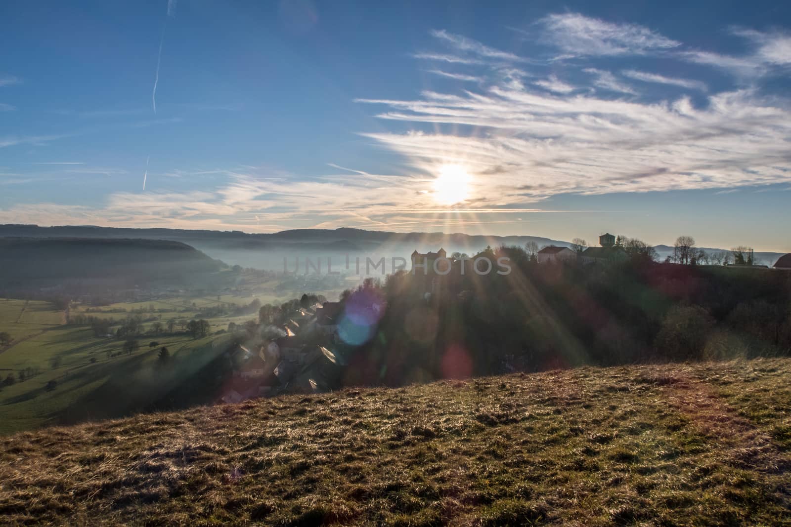 HDR shot of Belvoir castle in France. Landscape of small mountains, fields and forest