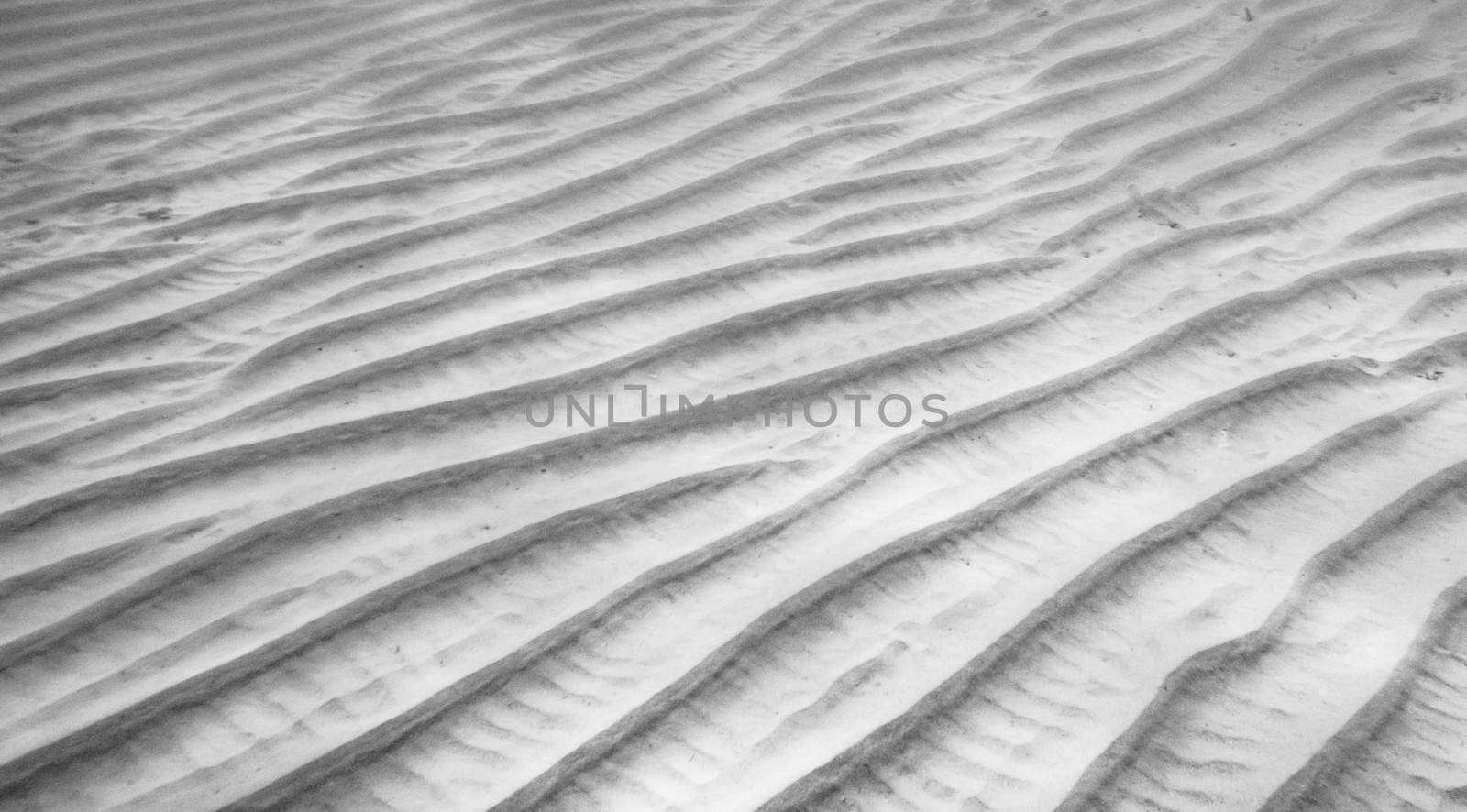 Sand texture underwater shaped by shallow waves by fpalaticky