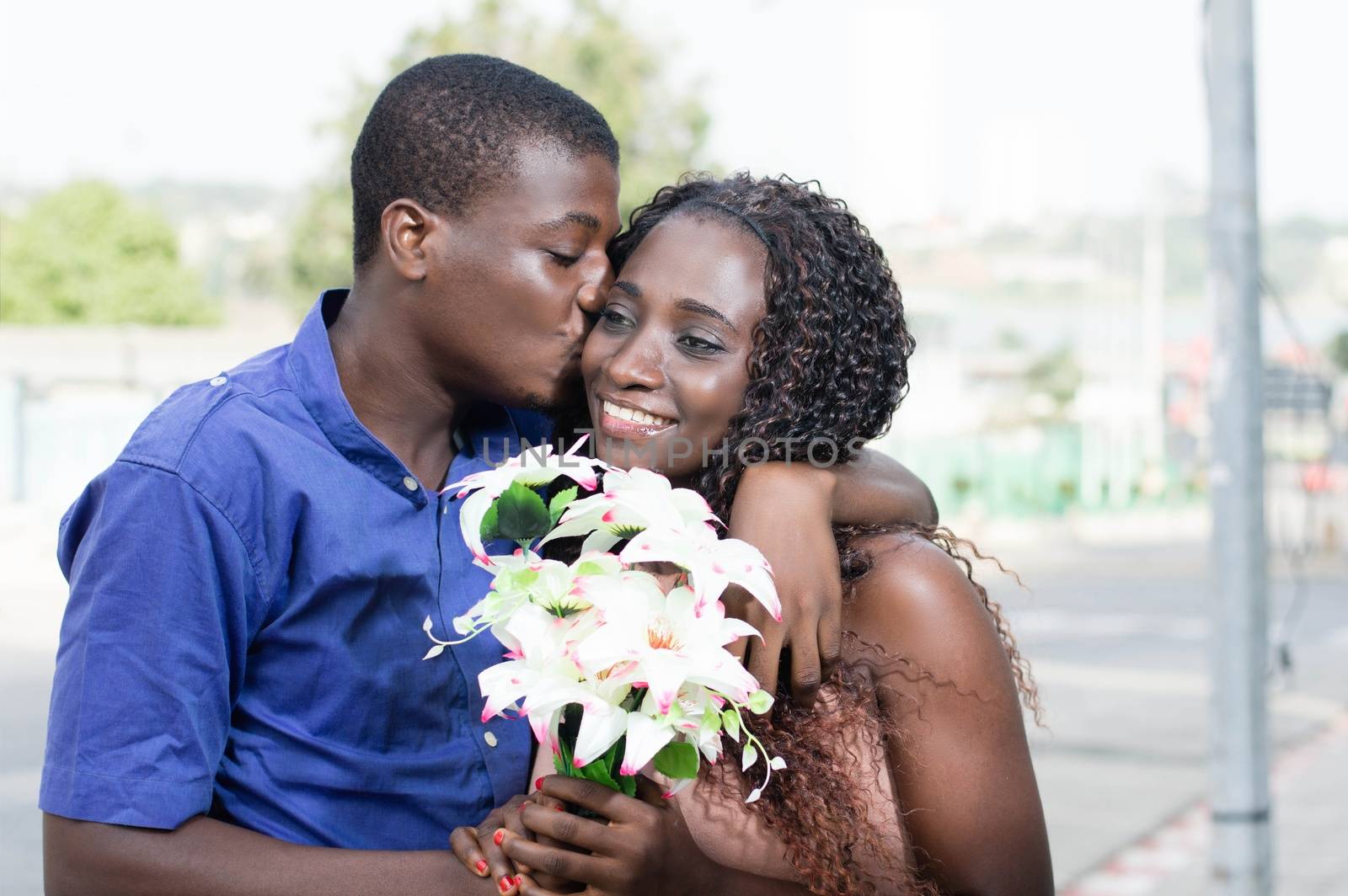 This young man give a kiss to his girlfriend that feels like.