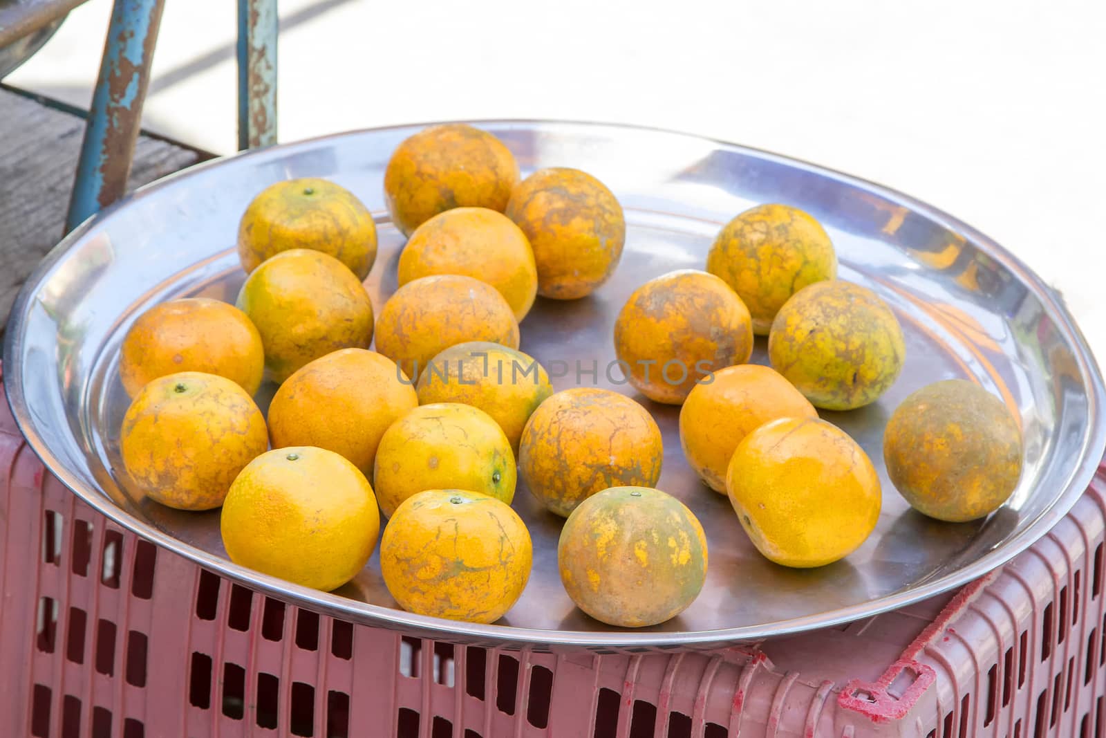 Orange in the tray stainless steel on street food