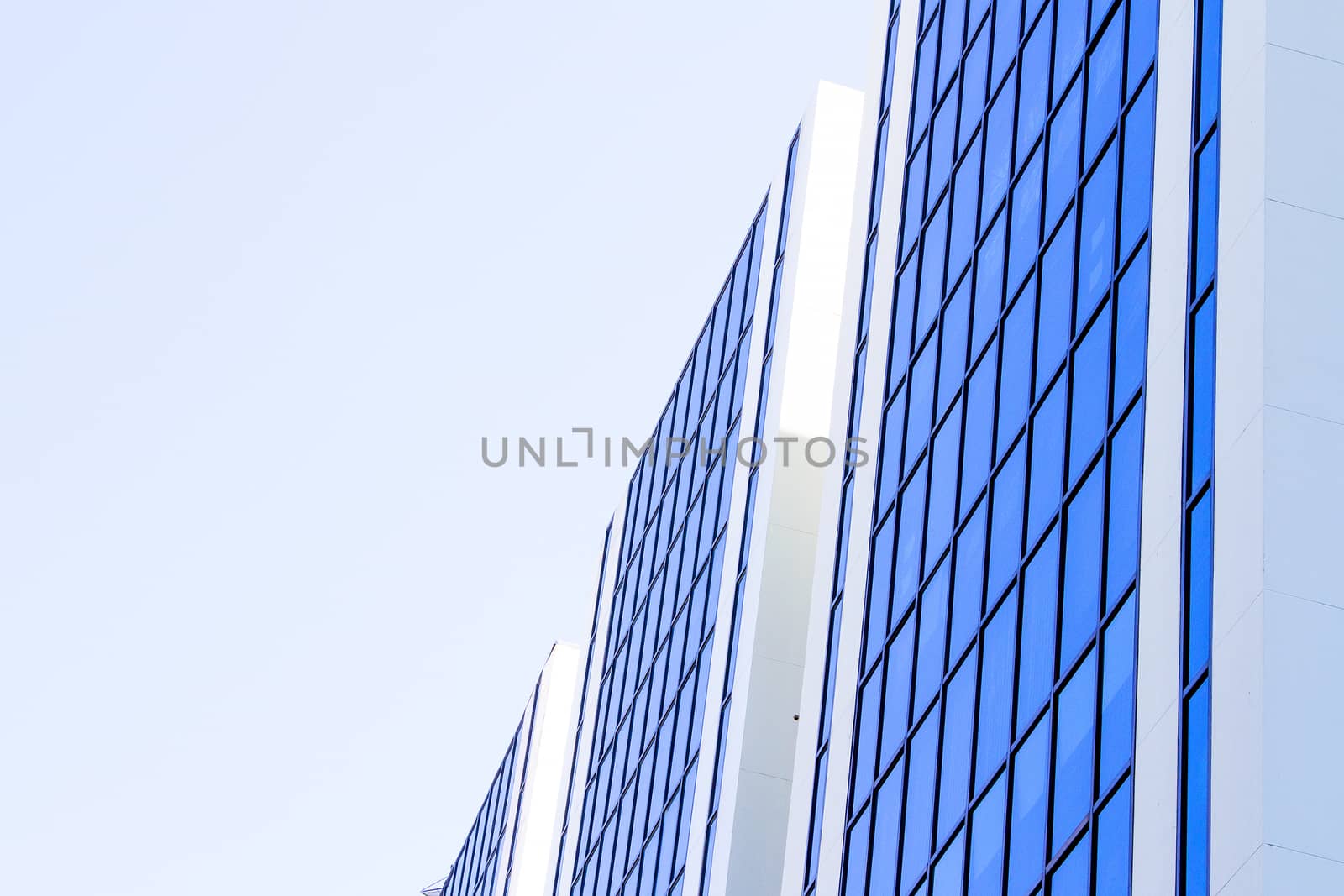 Blue sky reflected on blue building side by TakerWalker