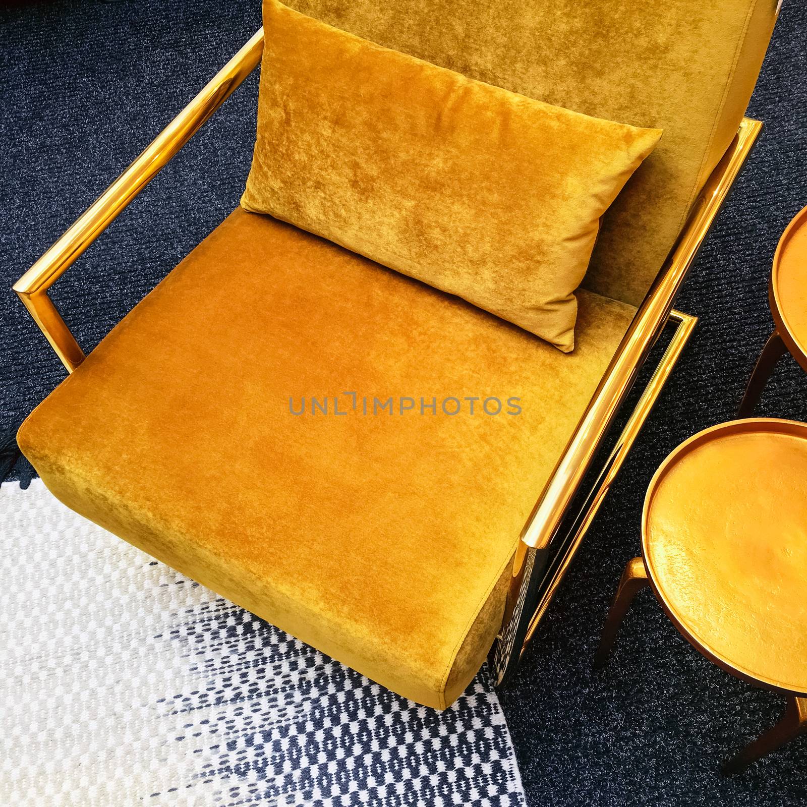 Retro style dark yellow velvet armchair and golden side table by anikasalsera