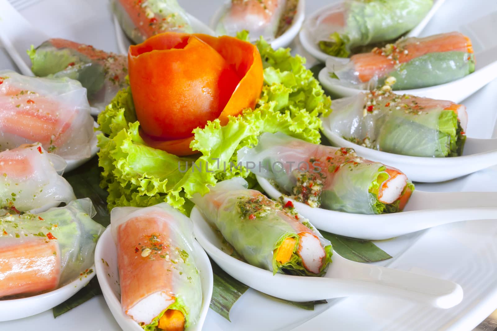 Fresh spring rolls with fresh vegetable served with salad cream dipping sauce.Fresh spring rolls
