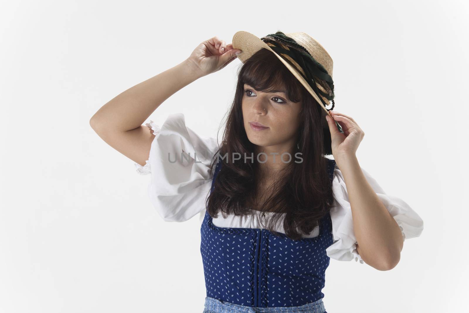 bavarian woman in a dirndl dress with a hat by bernjuer