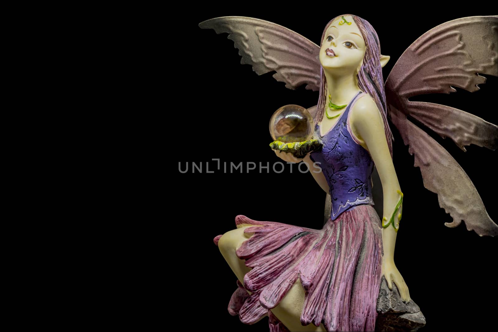 female elf figurine by vangelis