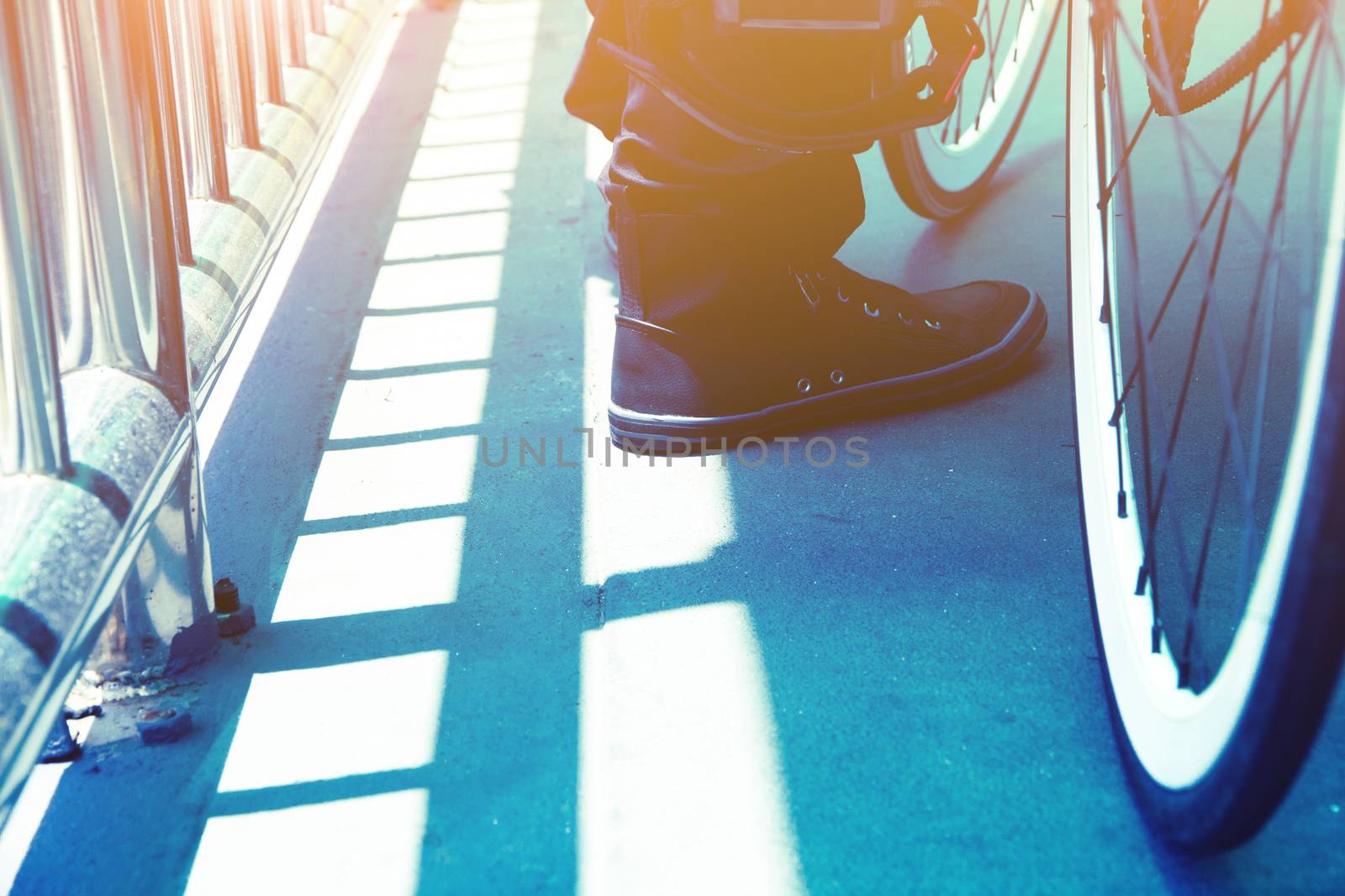 Close-up of man riding his bike in the street