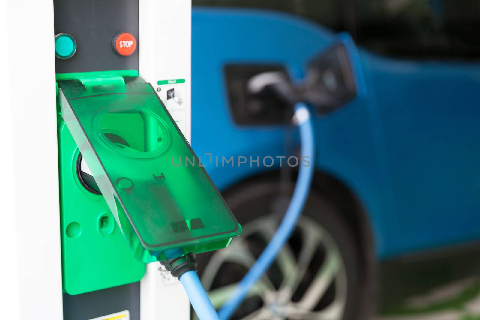 Charging battery of an electric car by wellphoto