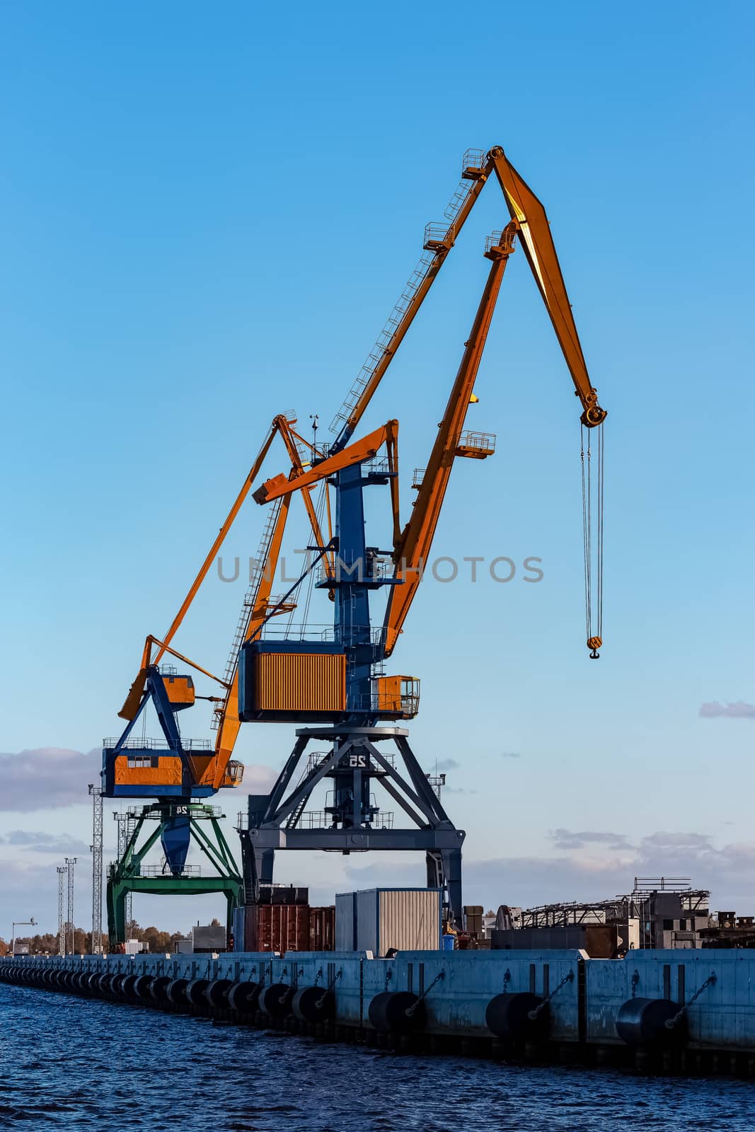 Yellow cargo cranes by sengnsp