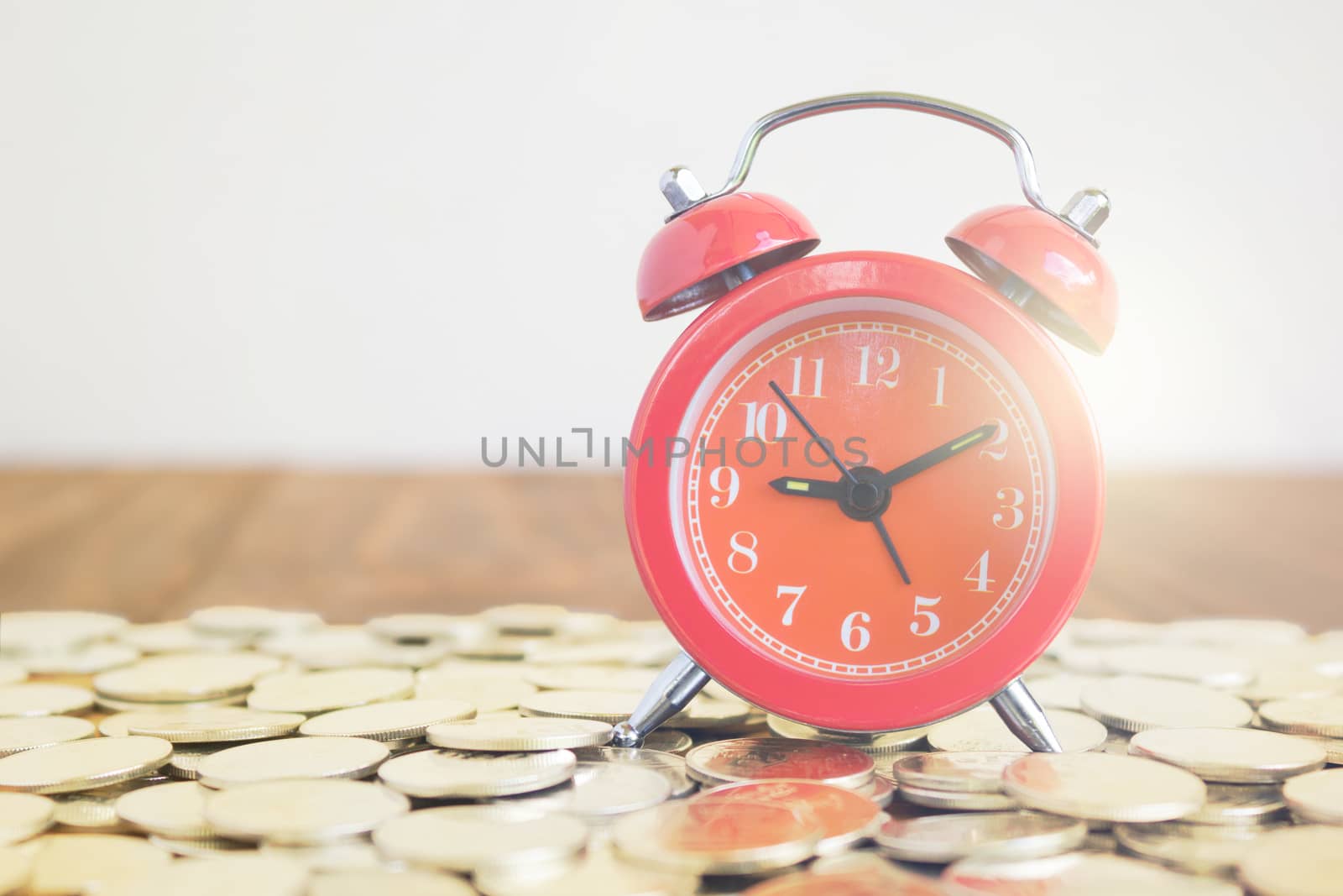 Image Of Coins With Red Fashioned Alarm Clock For Display Planni by rakoptonLPN