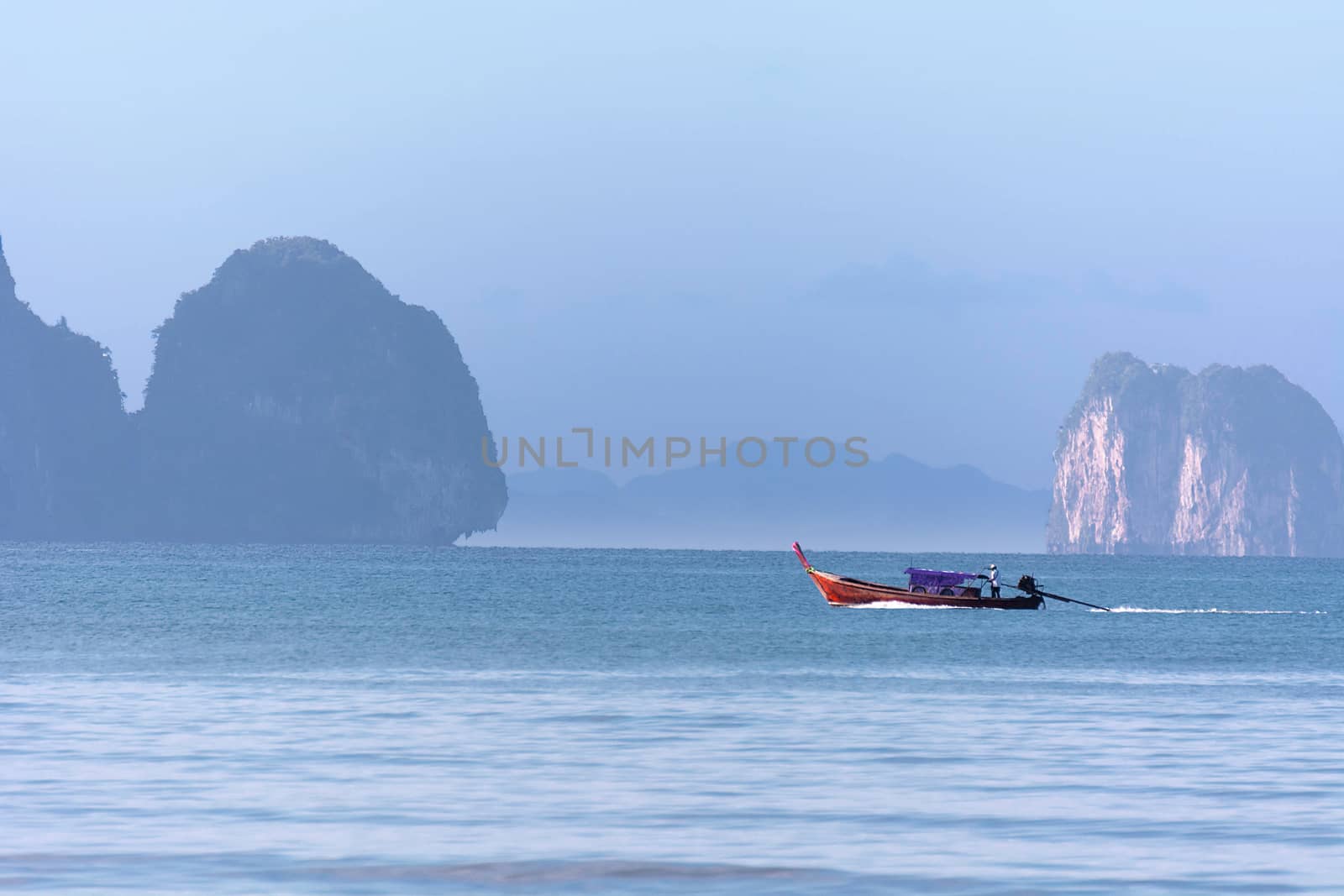 Wave of the sea on the sand beach, Beach and tropical sea, Paradise idyllic beach Krabi, Thailand, Summer holidays, Ocean in the evening as nature travel background.