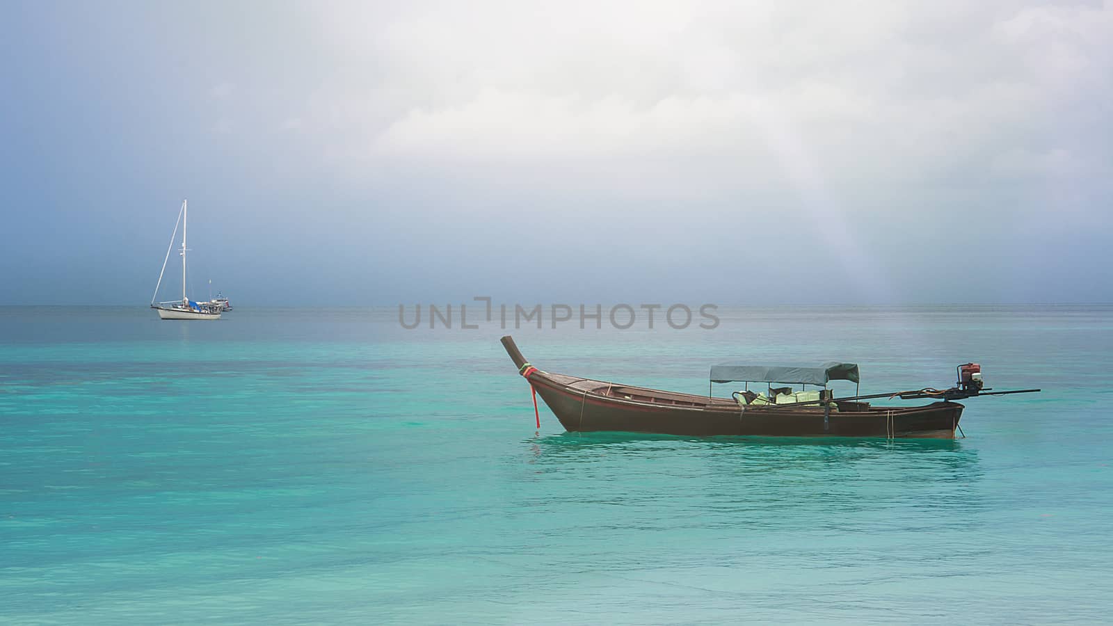 The Wooden Boat On Clear Blue Sea With Soft Light, Vintage Tone by rakoptonLPN