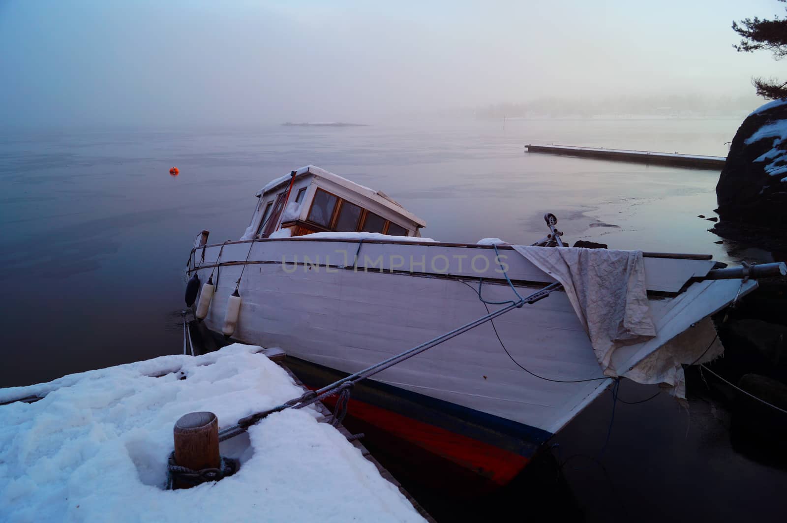 Sunken boat at dock