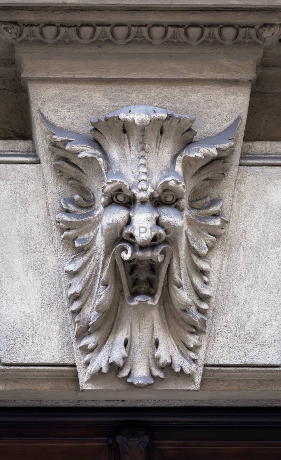 Italy, Turin. This city is famous to be a corner of two global magical triangles. This is a protective mask of stone on the top of a luxury palace entrance, dated around 1800