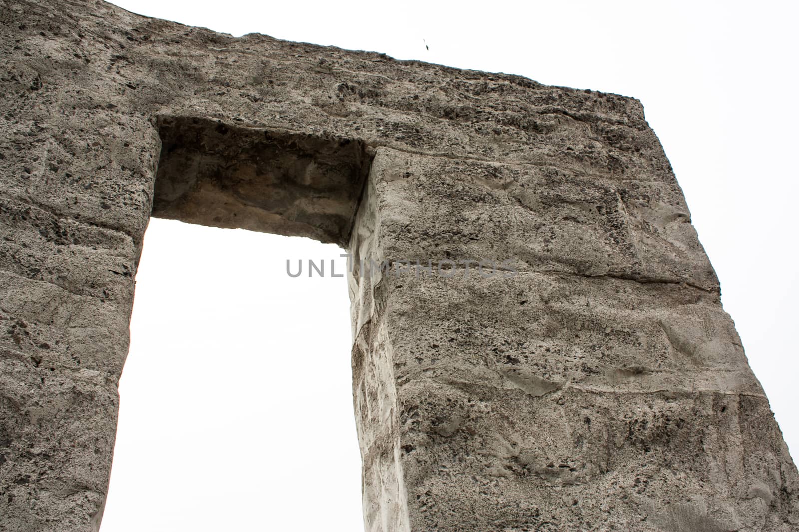 Concrete arch with square lines and a coarse texture