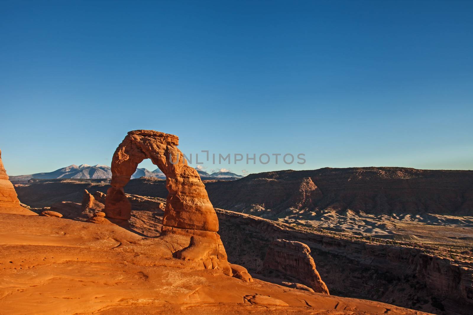 The Delicate Arch in Arches National Park, Utah, photographed just before sunset.