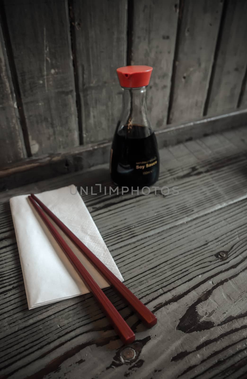 Detail Of An Asian Restaurant Counter Table With Soy Sauce, Chopsticks. And Copy Space