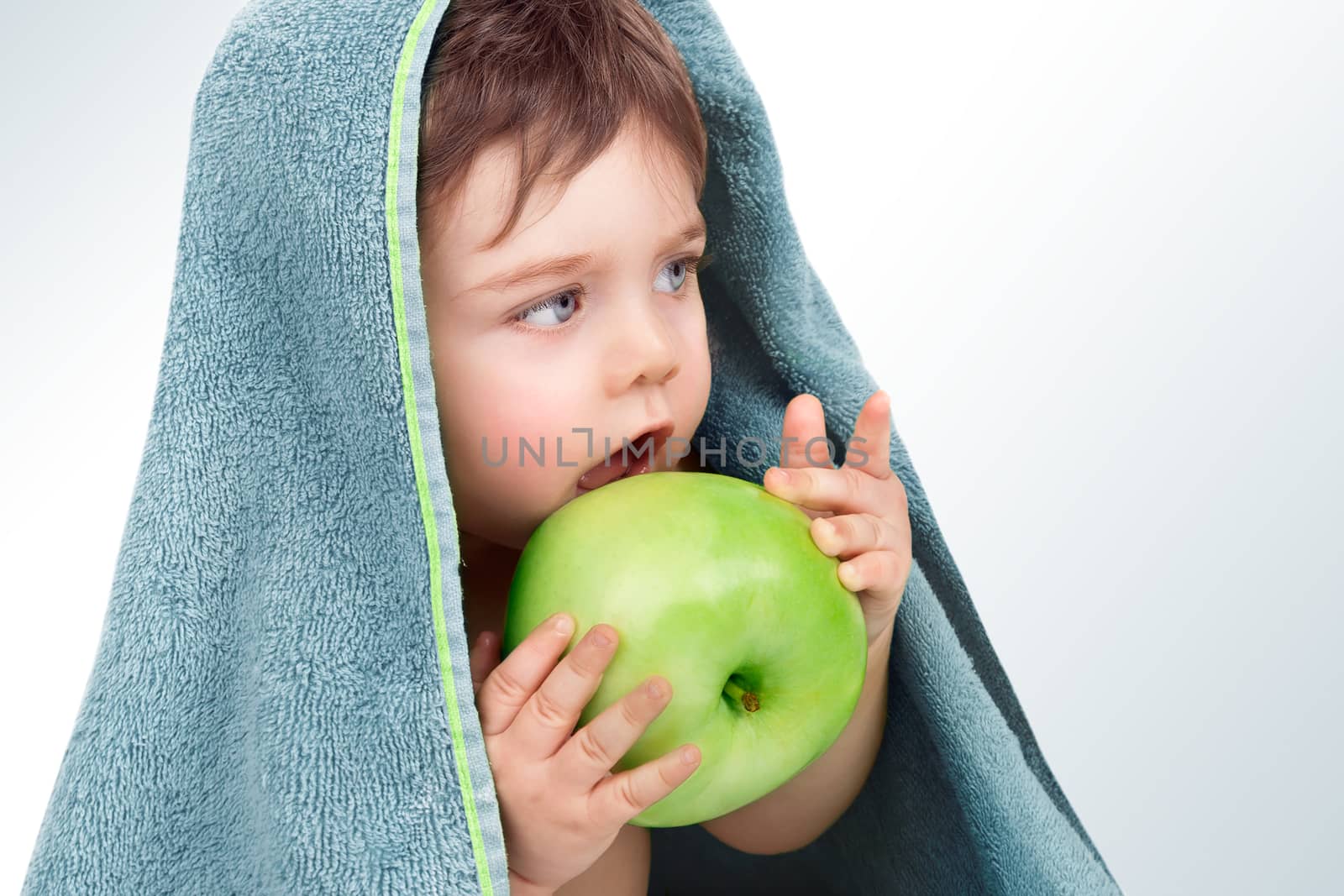 Baby boy eating apple by Anna_Omelchenko