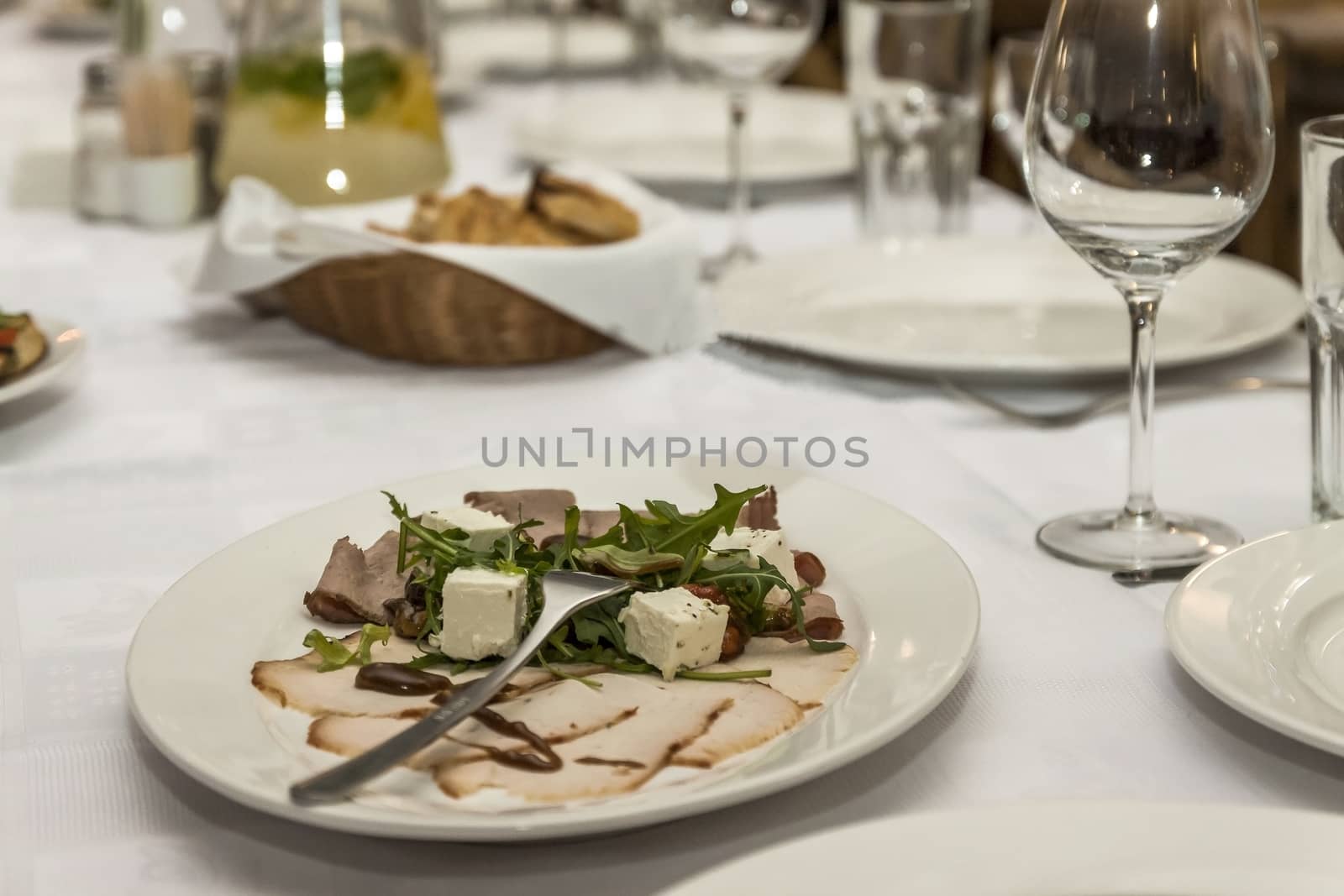 salad with avocado and tomato on a festive table by Tanacha