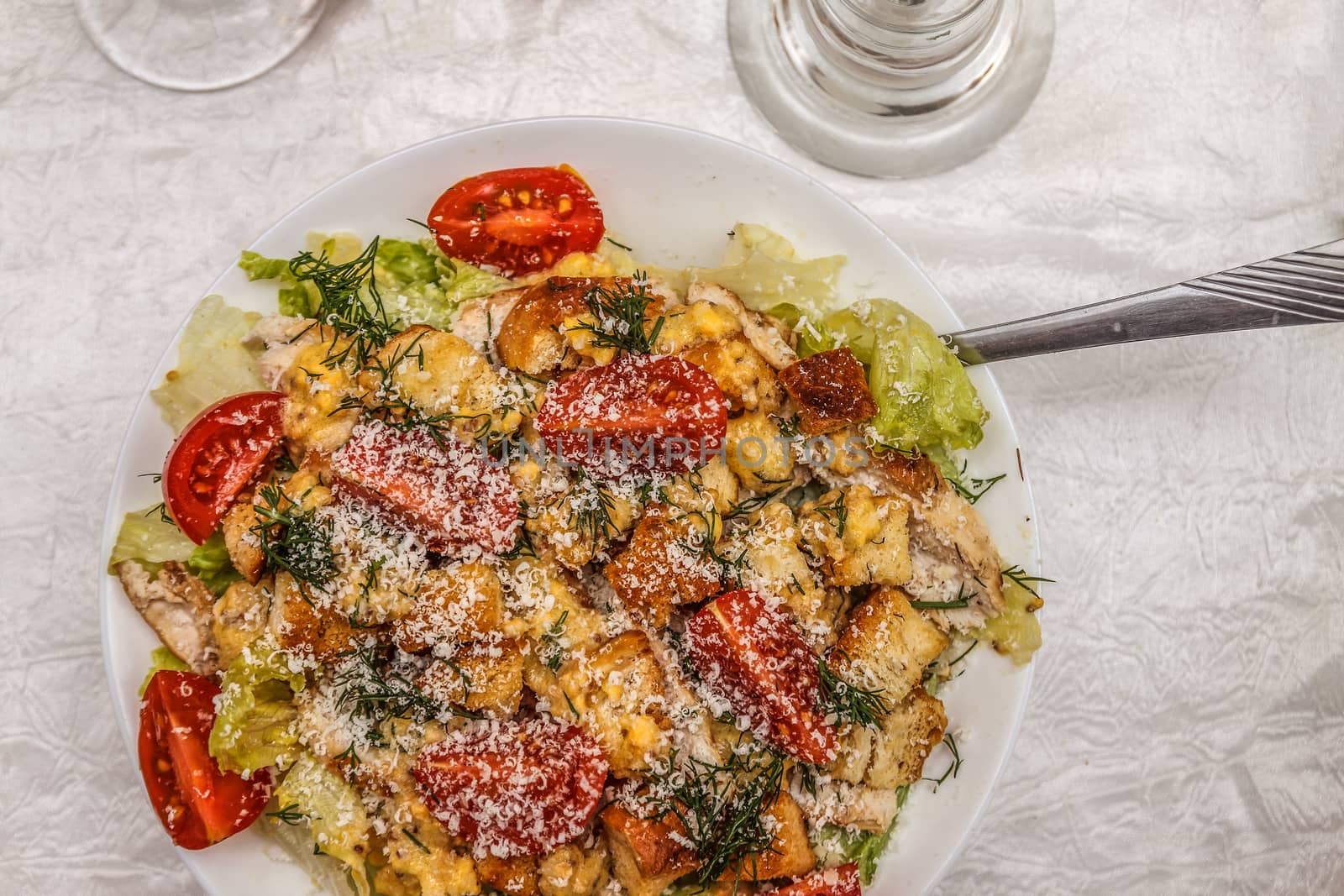 salad with avocado and tomato on a festive table by Tanacha