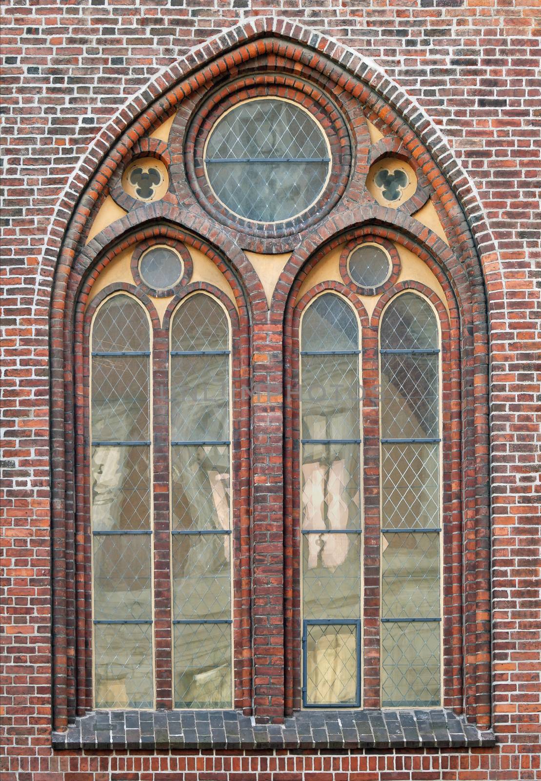 Ornamented window of a cathedral in gothic style