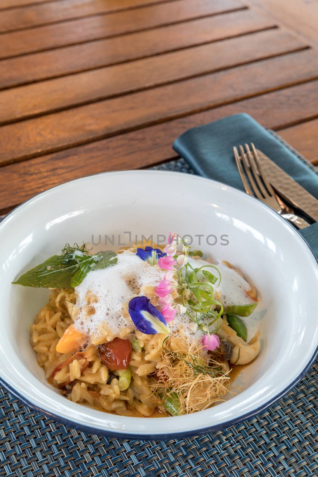 Risotto rice in traditional pan