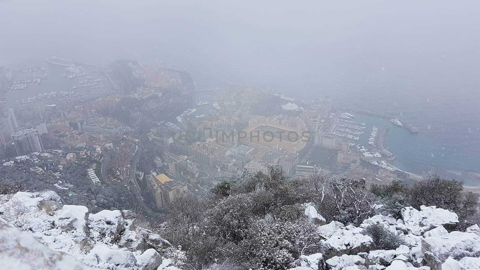 Beautiful Panoramic Aerial View of Monaco Under The Snow. Landscape of The French Riviera in Winter