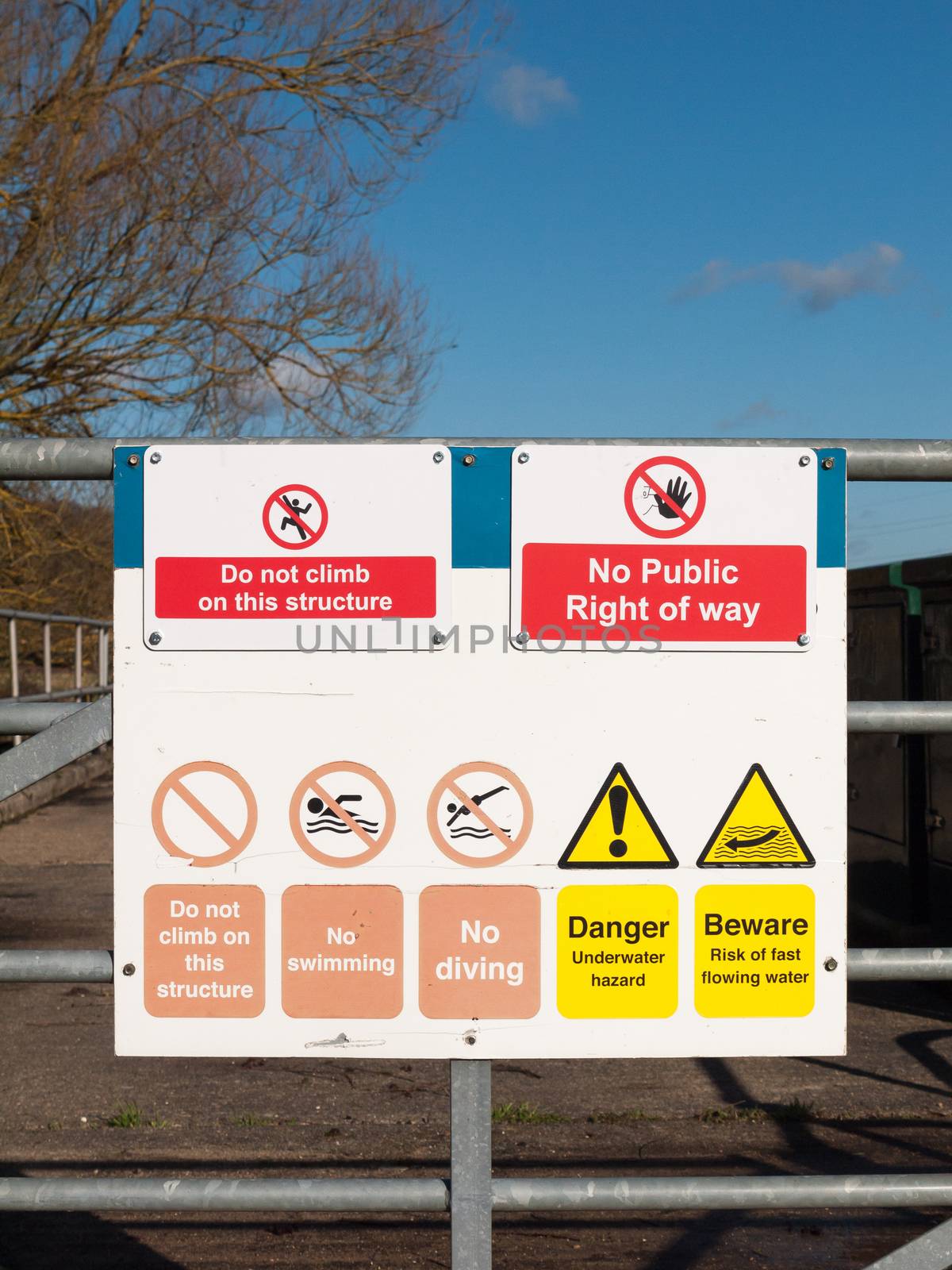 safety nature sign on locked metal gate do not climb this structure no public right of way warning; essex; england; uk