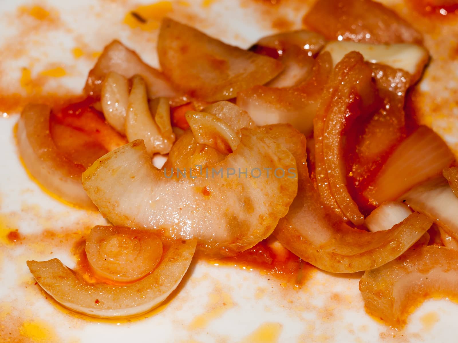 cooked onions close up macro plate food details; essex; england; uk