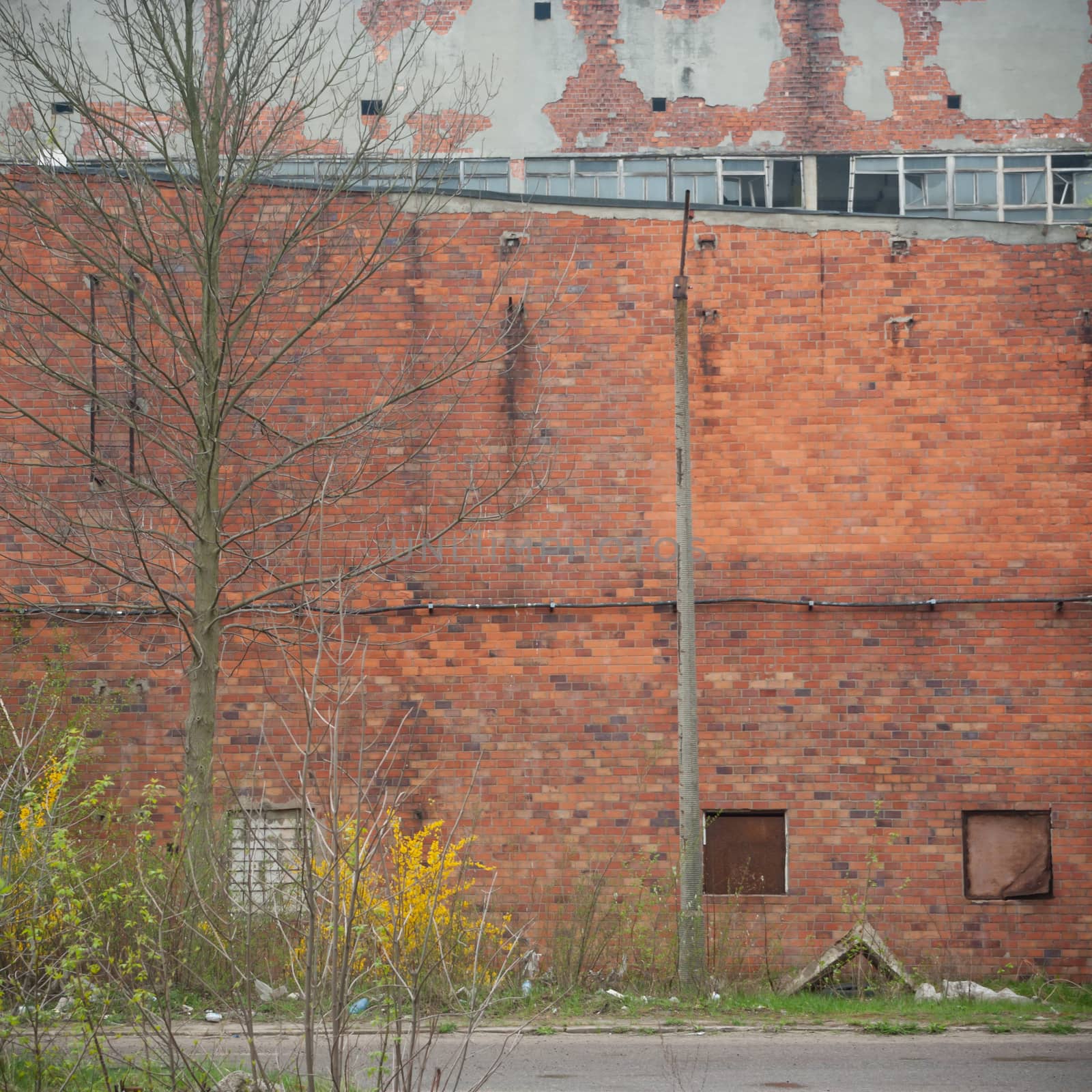 wide angle view of an old wall abandoned factory building