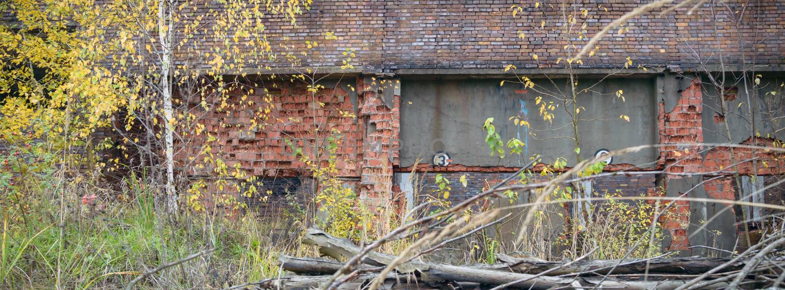 wide angle view of an old wall abandoned factory building