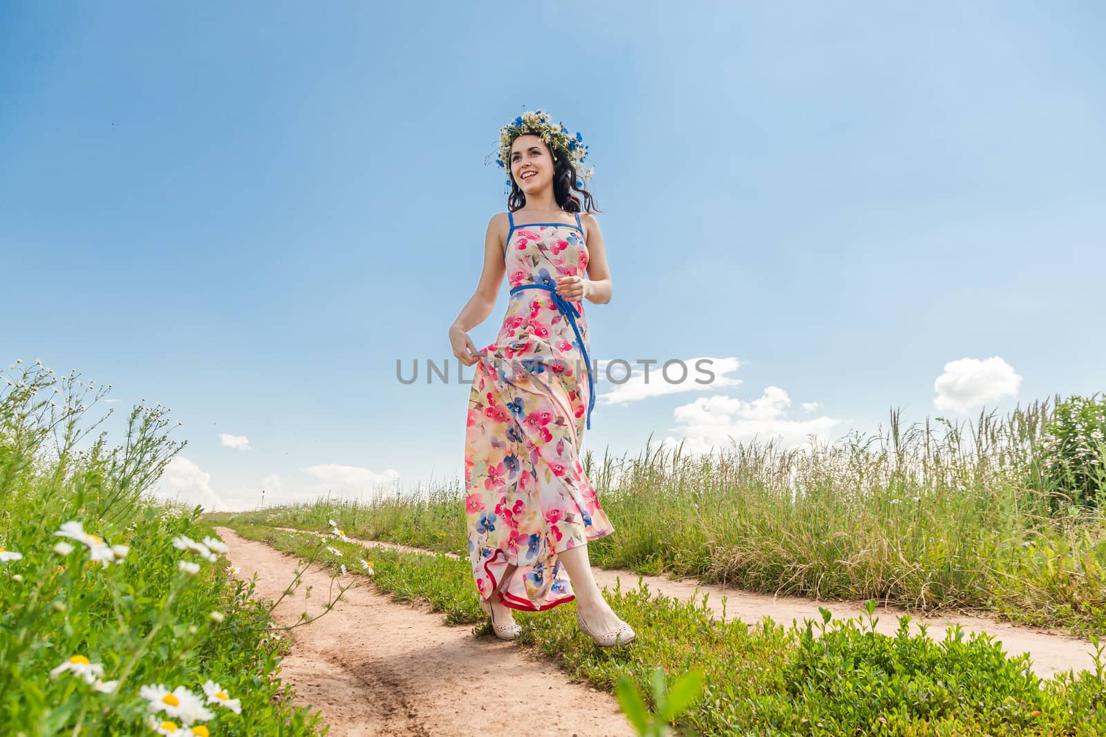 beautiful girl in field by sveter