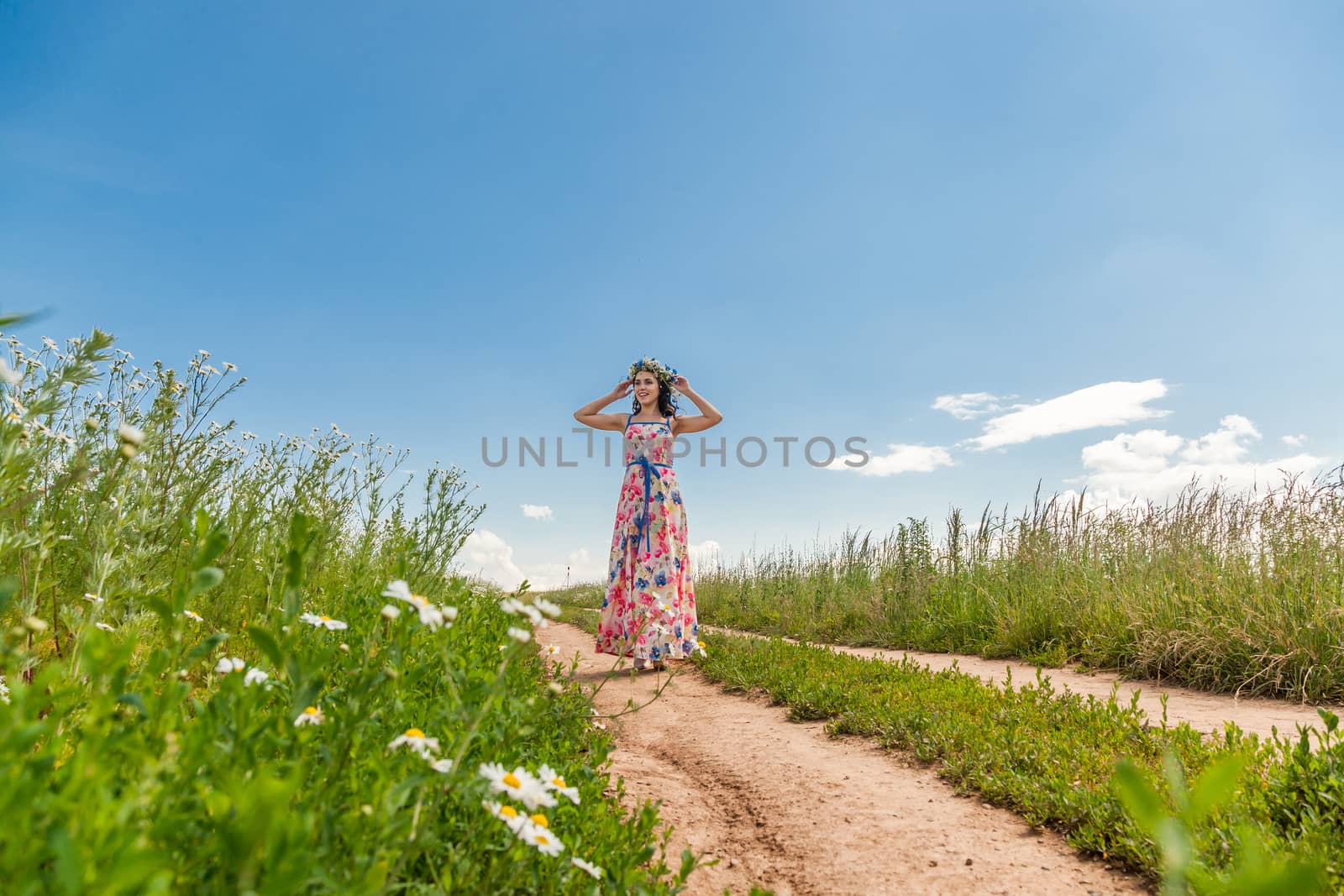 beautiful girl in field by sveter