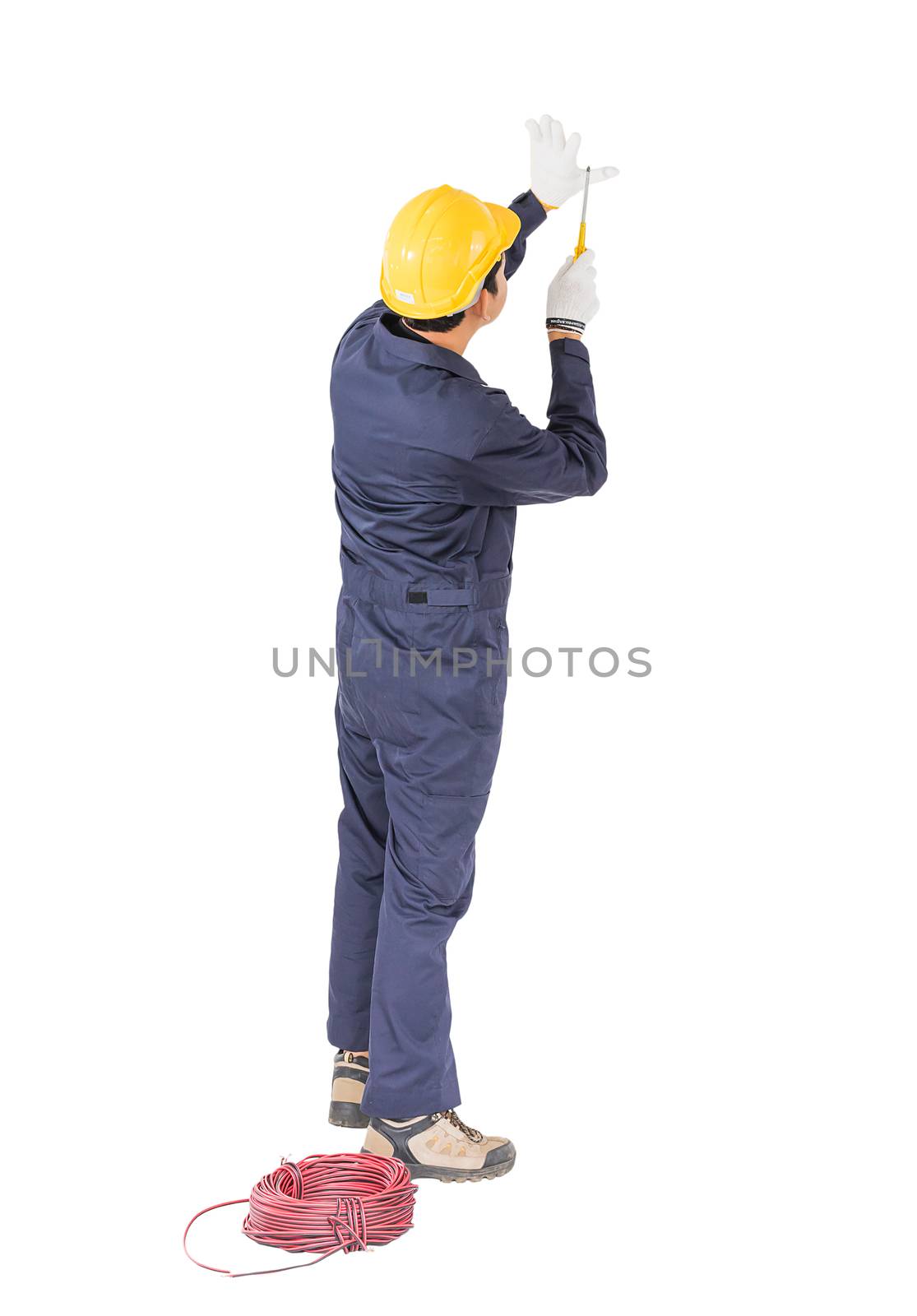 Electrician in unifrom with bunch of wires  invisible wall , isolated on white background cutout