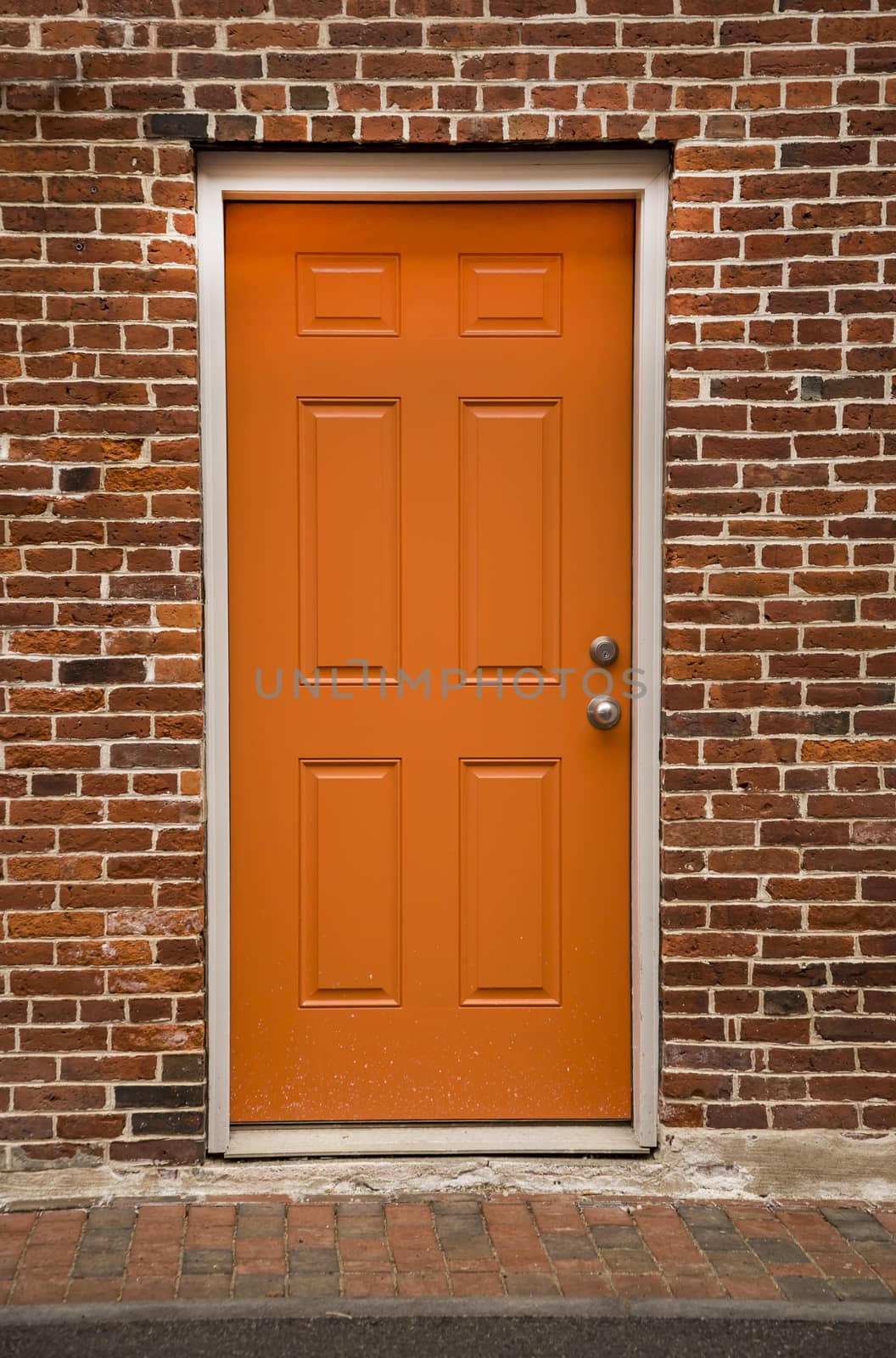 Door of a typical New England residential house with small entrance garden