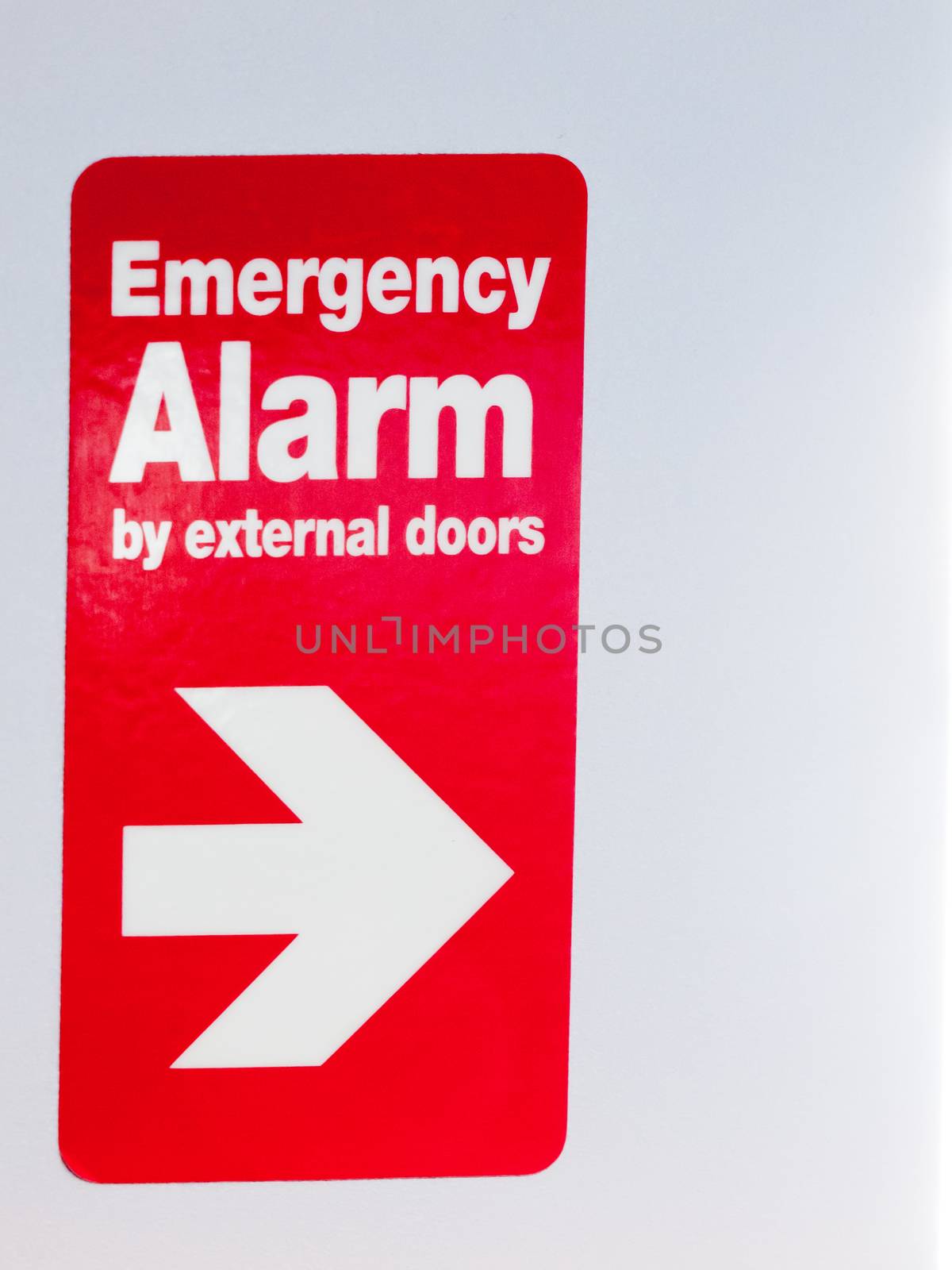 close up of red sign with direction emergency alarm by external  by callumrc