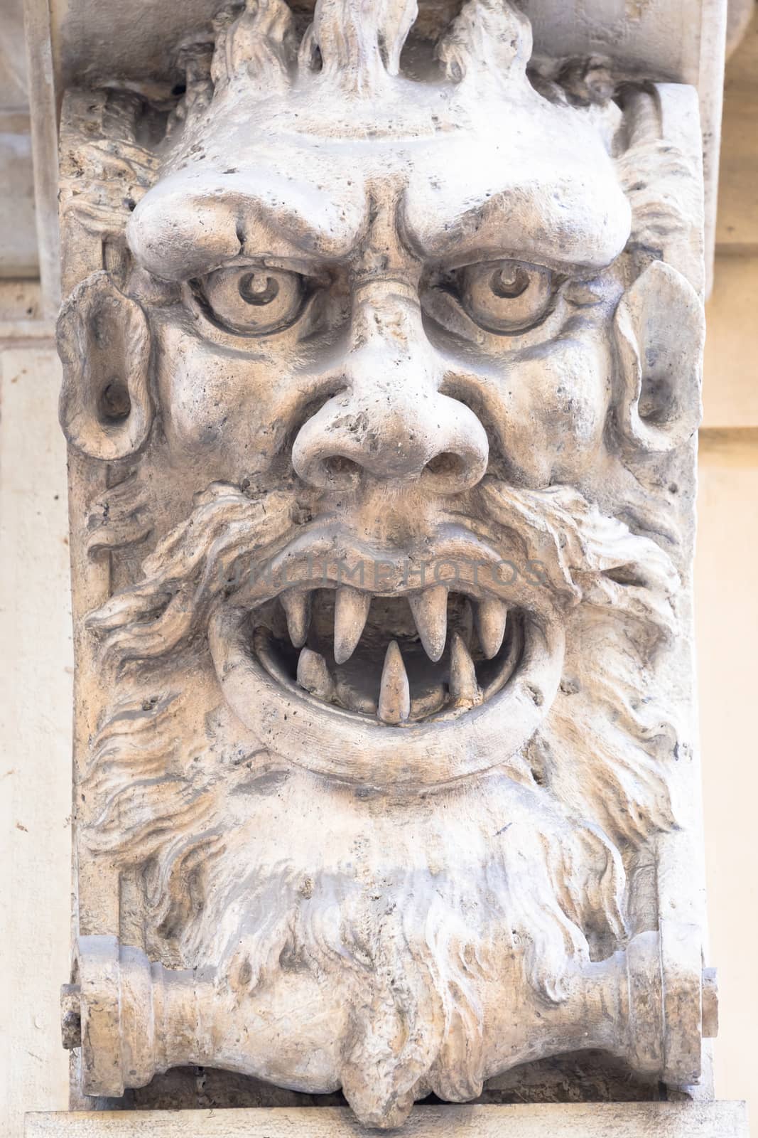Italy, Turin. This city is famous to be a corner of two global magical triangles. This is a protective mask of stone on the top of a luxury palace entrance, dated around 1800