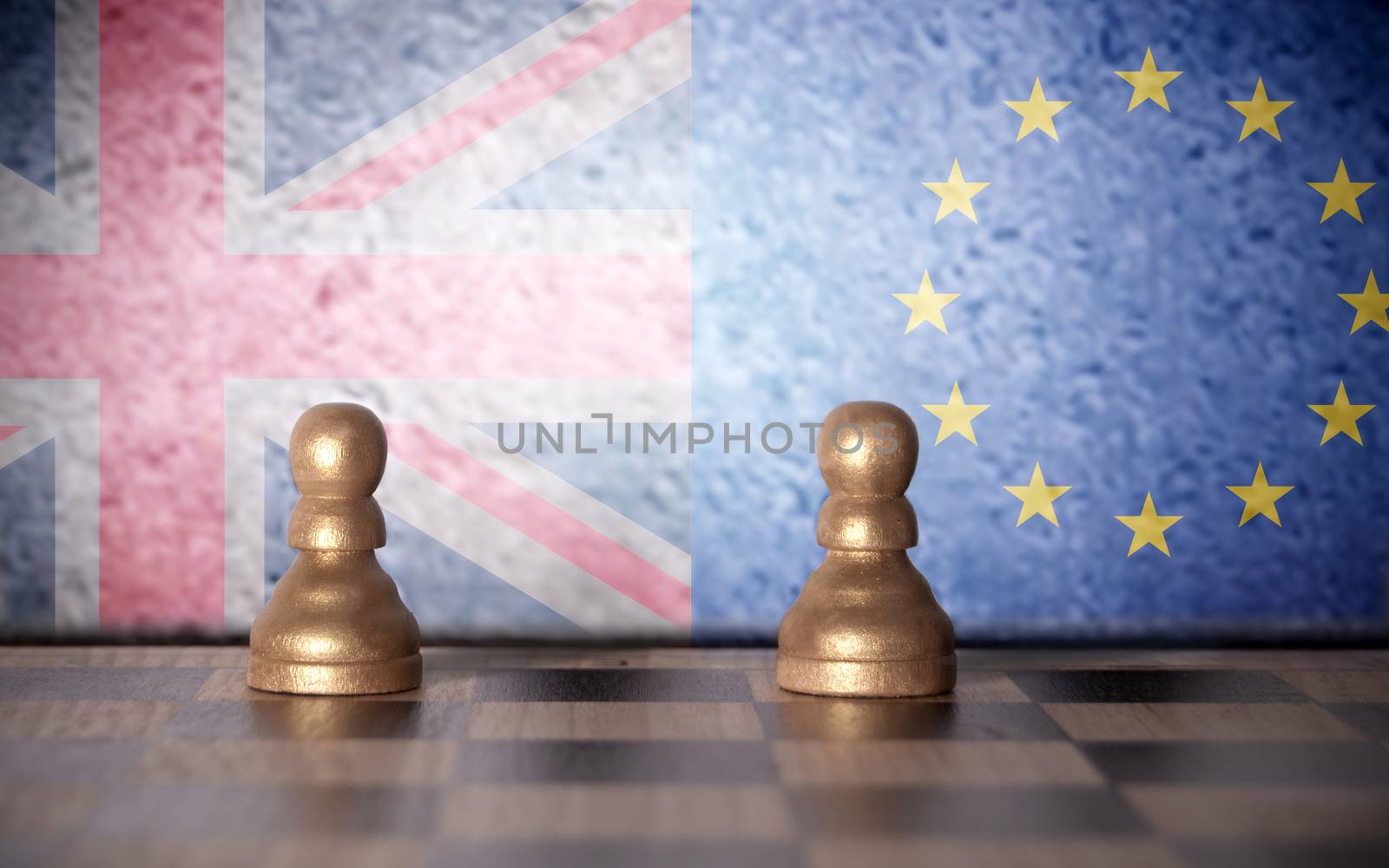 Chess pawns with european and  british flags painted on wall