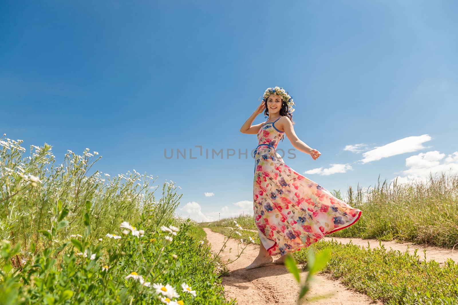 beautiful girl in field by sveter