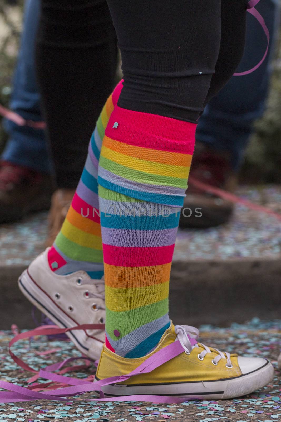 Colorful Carnival (Carnaval) Parade festival participants legs.