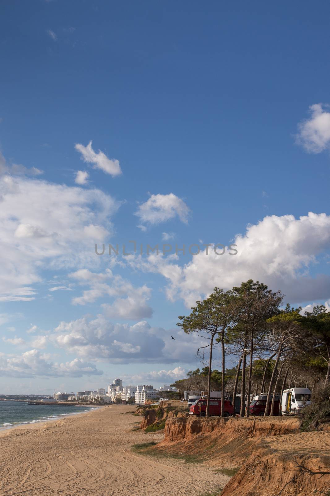 beach and cliffs in Quarteira by membio