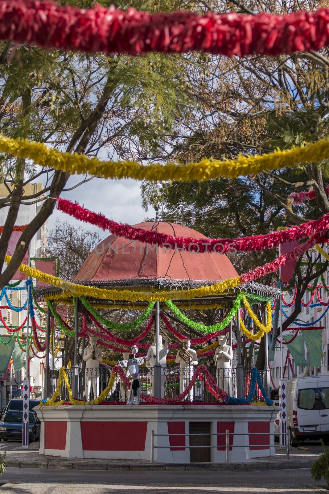 Outdoor view of the main avenue bandstand of Loule city with carnival decoration.
