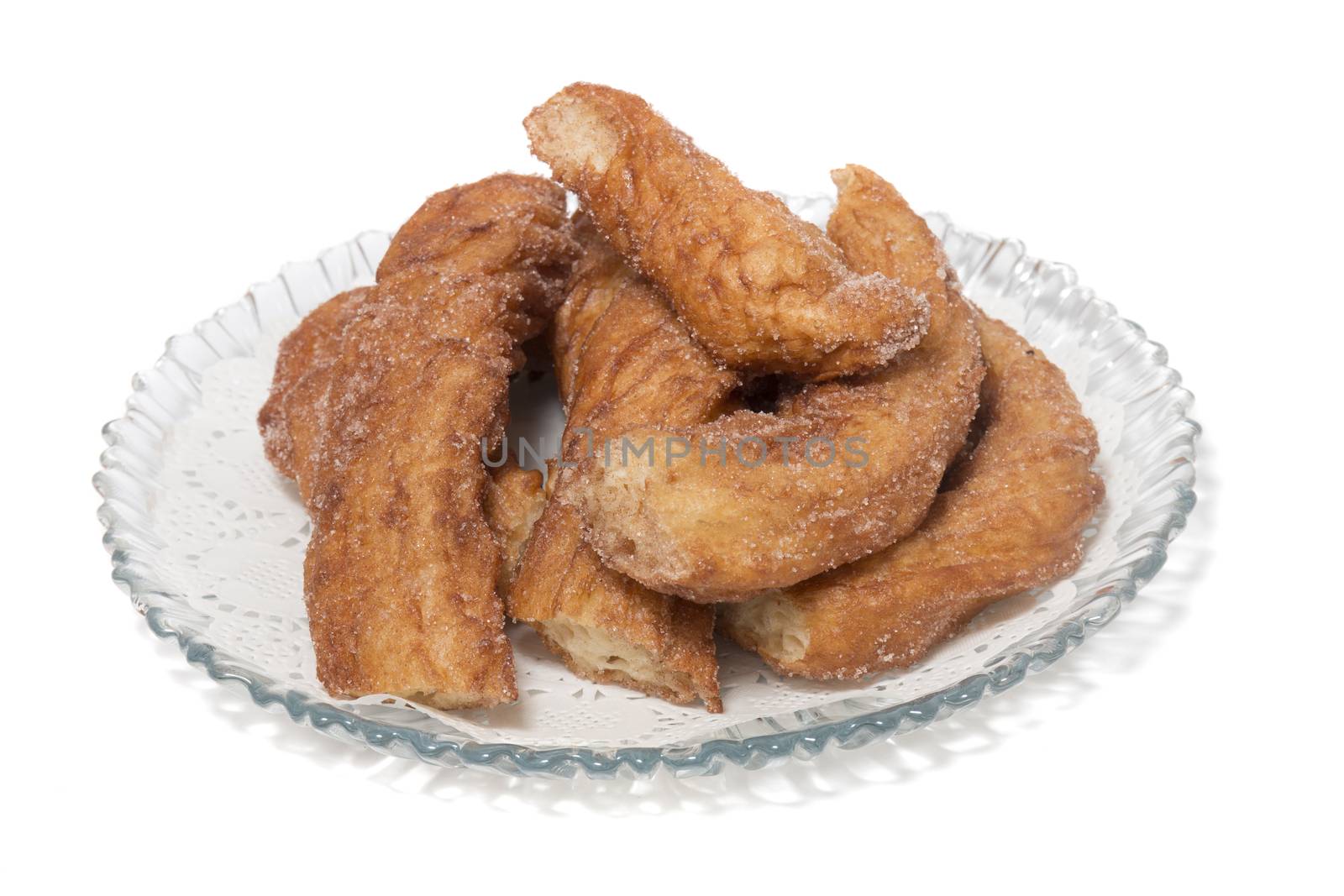 Portuguese Farturas or Spanish Churros, Fried dough sticks isolated on a white background.