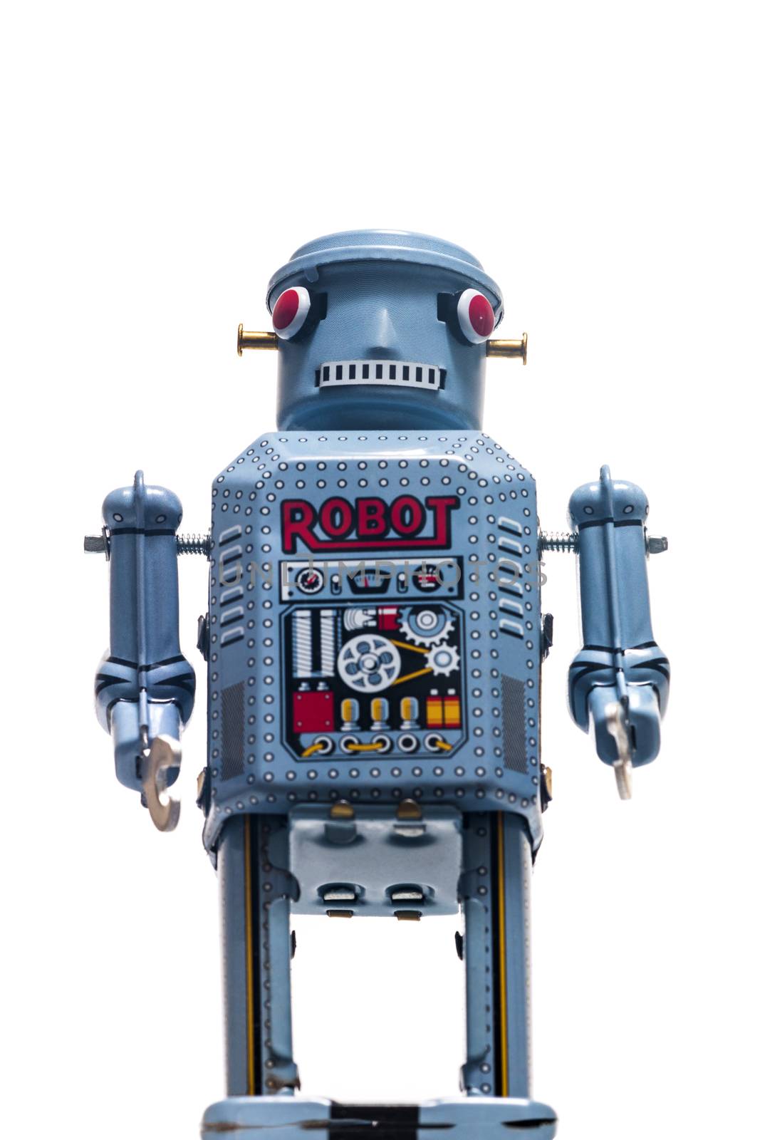 Vintage tin robot toy isolated on a white background.