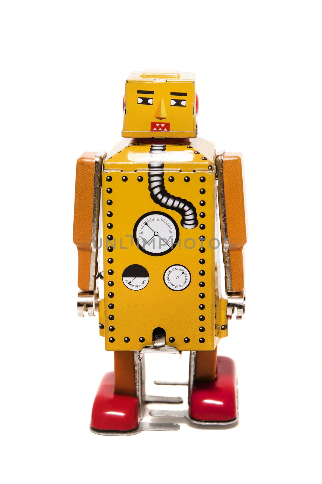 Vintage tin robot toy isolated on a white background.